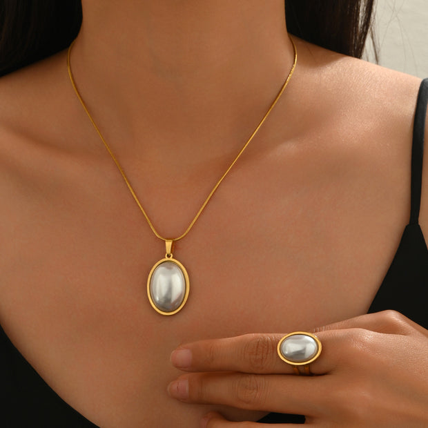 Lxalry Golden Jewelry Set - Elegant Necklace & Ring Combo With Oval Design, Metal Polished Finish, Perfect For Day & Night Occasions
