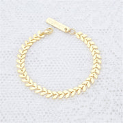 Simple fashion bracelet with golden leaves