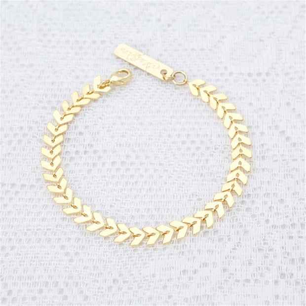 Simple fashion bracelet with golden leaves