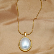 Lxalry Golden Jewelry Set - Elegant Necklace & Ring Combo With Oval Design, Metal Polished Finish, Perfect For Day & Night Occasions