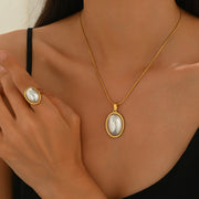 Lxalry Golden Jewelry Set - Elegant Necklace & Ring Combo With Oval Design, Metal Polished Finish, Perfect For Day & Night Occasions